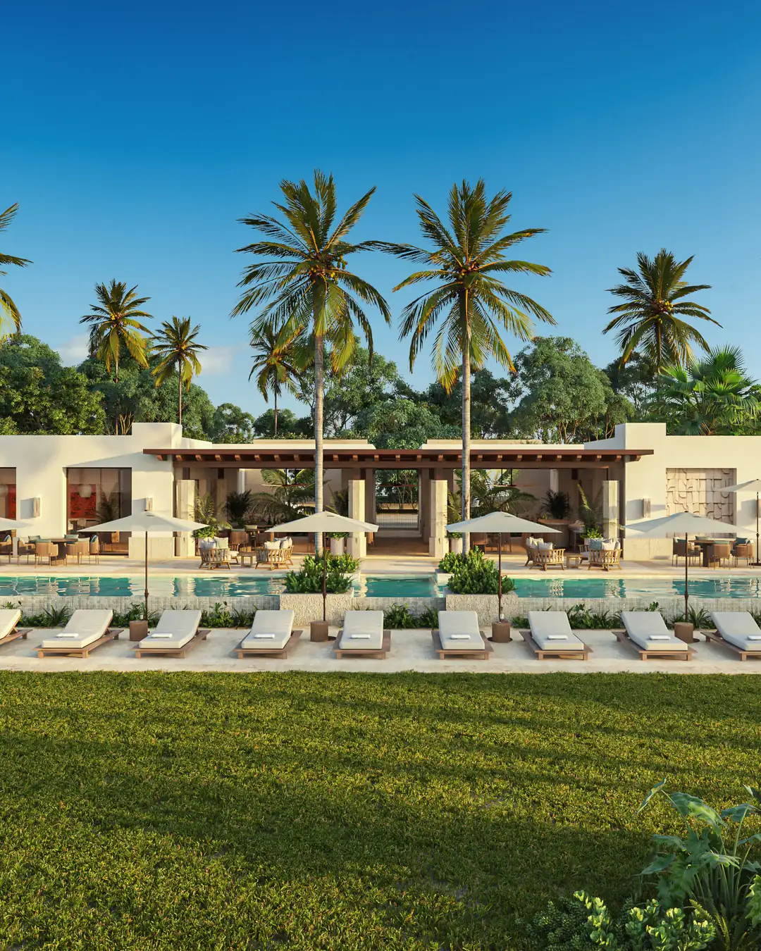 Augusta at Country Lakes clubhouse with pool, loungers and gardens among palm trees