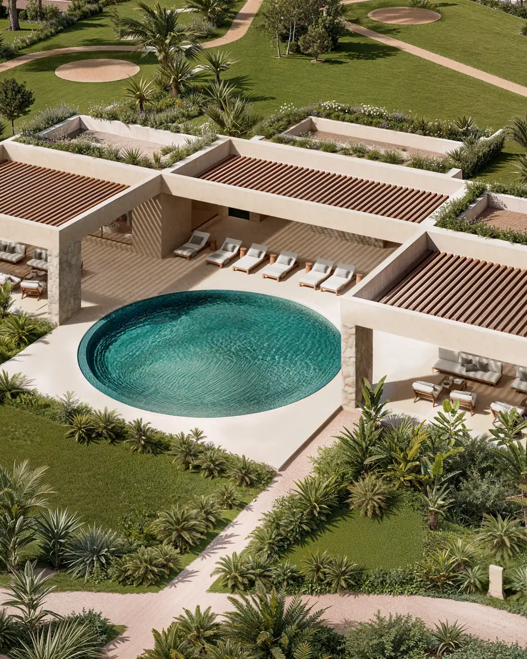 Aerial view of the Ophidia clubhouse, with a circular pool, pergolas and loungers beside the golf course