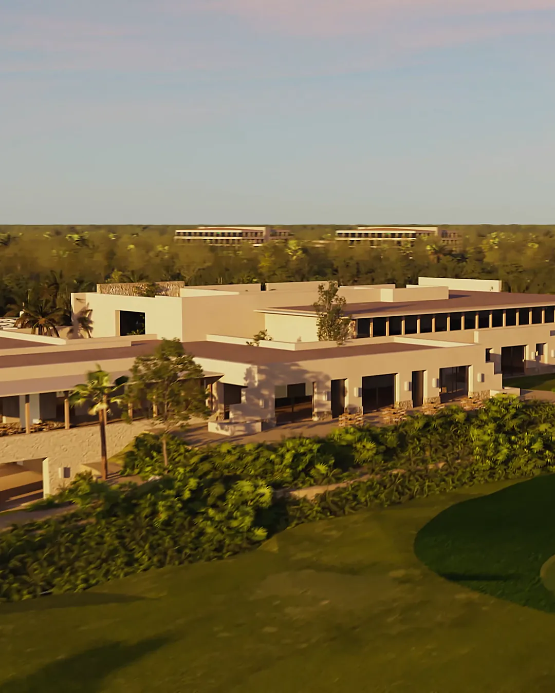 The Country Lakes Golf Club clubhouse in the late-afternoon sun, among palms and overlooking a green